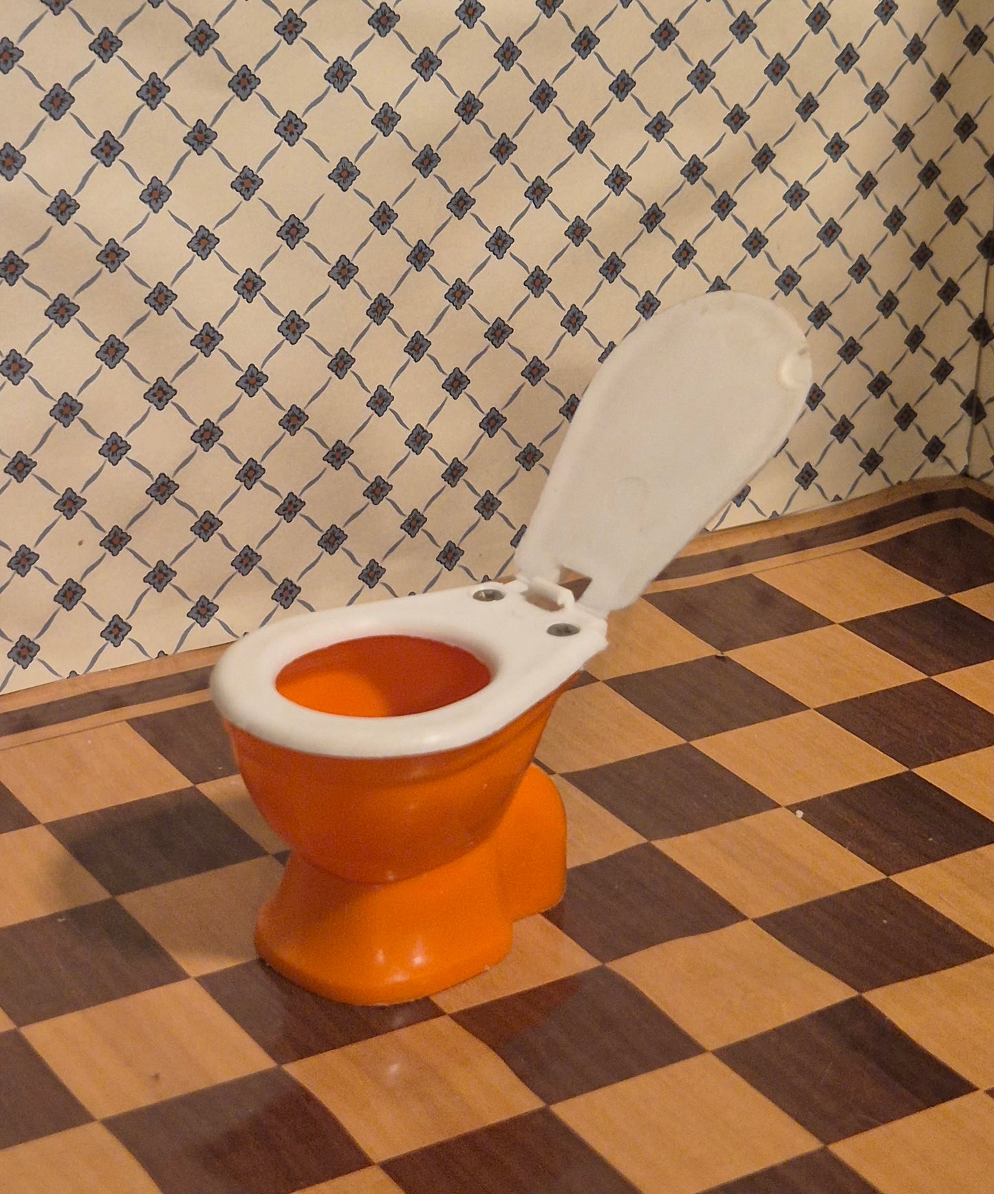 Bambola toilet