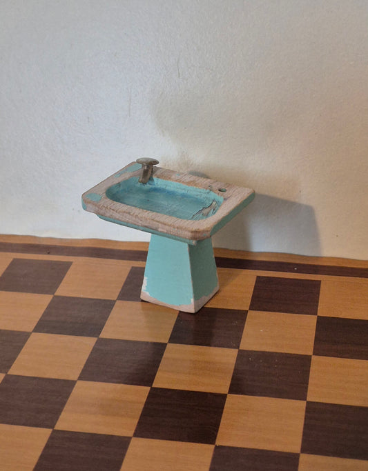 Lisa håndvask, slid