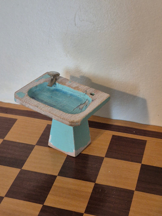 Lisa håndvask, slid