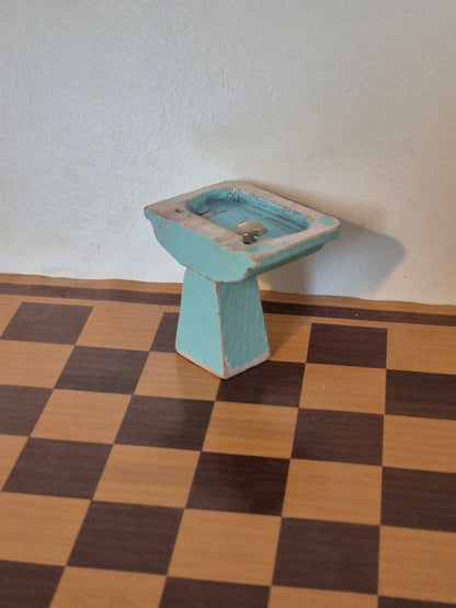 Lisa håndvask, slid