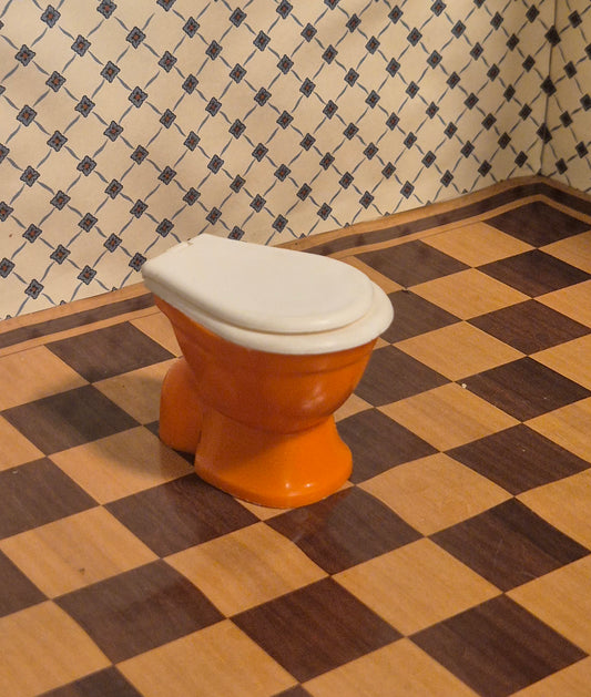 Bambola toilet