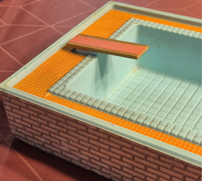 Lundby swimmingpool med brugsspor