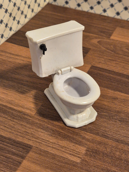 Renwal  toilet, skadet